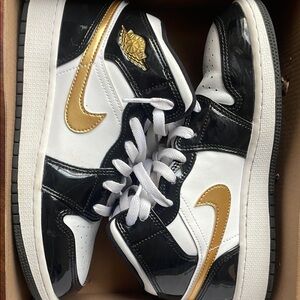 Stylish Black and White High-Top Jordan’s